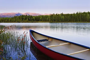 Artist's Choice: Canoe And Boya Lake At Sunset, Boya Lake Provincial Park, Northern British Columbia Artist's Choice: Canoe And Boya Lake At Sunset, Boya Lake Provincial Park, Northern British Columbia