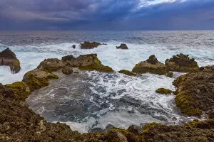 African Places And Things Collection: Atlantic Ocean and lava rock coast at dawn at Charco del Viento in La Guancha on Tenerife in