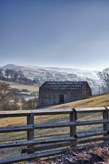 A Barn On A Hilly Landscape In The Fog; Yorkshire Dales, England A Barn On A Hilly Landscape In The Fog; Yorkshire Dales, England