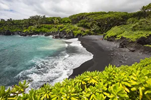 The Black Sand Beach At Waianapanapa State Park; Hana, Maui, Hawaii, United States Of America The Black Sand Beach At Waianapanapa State Park; Hana, Maui, Hawaii, United States Of America