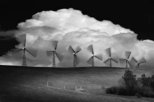 Black And White Of Wind Generators With Cloud In Background Black And White Of Wind Generators With Cloud In Background