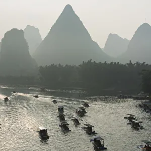 Boats Along The Li River At Sunset; Guilin, Guangxi, China Boats Along The Li River At Sunset; Guilin, Guangxi, China