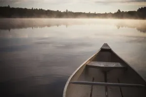Canoe In Morning Fog On Duck Lake; Kirkfield, Ontario Canoe In Morning Fog On Duck Lake; Kirkfield, Ontario