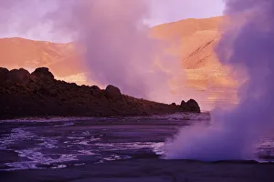 Chile, Late Afternoon Lighting; Atacama Desert, Steam rising from soil, El Tatio Geysers Chile, Late Afternoon Lighting; Atacama Desert, Steam rising from soil, El Tatio Geysers