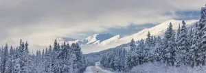 Clouds Clearing Over Seward Highway From The Kenai Mountains Above Turnagain Pass After A Winter Snow Storm Clouds Clearing Over Seward Highway From The Kenai Mountains Above Turnagain Pass After A Winter Snow Storm