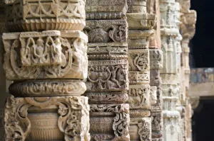 Details of the columns in the Qutab complex which includes the world's tallest brick minaret - the Minar - as well Details of the columns in the Qutab complex which includes the world's tallest brick minaret - the Minar - as well