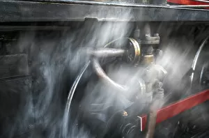 Rail Transportation Collection: Dust Blurs The Wheels Of A Railroad Car; North Yorkshire, England