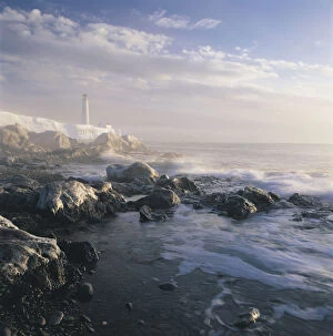 Images Dated 22nd January 2012: Fog And Rocky Shoreline In Winter With Cap Des Rosiers Lighthouse, Northeast Gasp