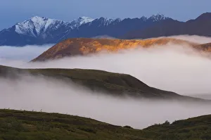Fog Settles Between Mountain Ridges At Sunrise In Sable Pass, Denali National Park, Alaska Fog Settles Between Mountain Ridges At Sunrise In Sable Pass, Denali National Park, Alaska