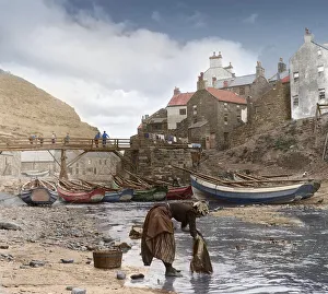 Frank Meadow Sutcliffe original of lady washing clothes at Staithes, hand coloured Frank Meadow Sutcliffe original of lady washing clothes at Staithes, hand coloured