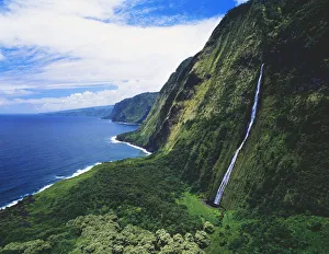 Hawaii, Big Island, Hamakua Coast, Waterfalls Cascade Into The Ocean Hawaii, Big Island, Hamakua Coast, Waterfalls Cascade Into The Ocean