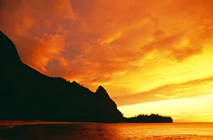 Hawaii, Kauai, Napali Coast, Bali Hai At Sunset, Bright Orange Sky And Calm Ocean Hawaii, Kauai, Napali Coast, Bali Hai At Sunset, Bright Orange Sky And Calm Ocean