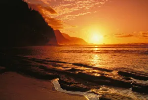 Hawaii, Kauai, Napali Coast At Sunset, Bright Orange Sky And Calm Ocean Hawaii, Kauai, Napali Coast At Sunset, Bright Orange Sky And Calm Ocean