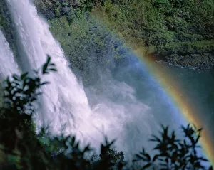 Hawaii, Kauai, View Looking Down Wailua Falls With Rainbow Arching Across Into Water Hawaii, Kauai, View Looking Down Wailua Falls With Rainbow Arching Across Into Water