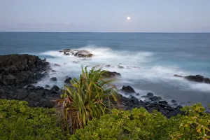 Hawaii, Maui, Hana, The moon rising over soft ocean Hawaii, Maui, Hana, The moon rising over soft ocean