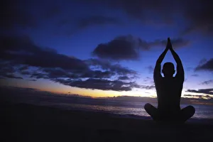 Hawaii, Oahu, Fit Young Guy On The Beach Doing Yoga On The Coastline Hawaii, Oahu, Fit Young Guy On The Beach Doing Yoga On The Coastline