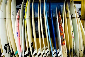 Hawaii, Oahu, North Shore, Haleiwa, row of surfboards outside of a surfshop Hawaii, Oahu, North Shore, Haleiwa, row of surfboards outside of a surfshop