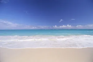 Hawaii, Pristine White Sand Beach With Clear Turquoise Water, Blue Sky On Horizon Hawaii, Pristine White Sand Beach With Clear Turquoise Water, Blue Sky On Horizon