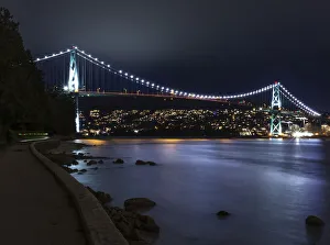 Illuminated Lions Gate Bridge viewed from Stanley Park, Vancouver, BC, Canada Illuminated Lions Gate Bridge viewed from Stanley Park, Vancouver, BC, Canada