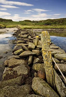 Isle Of Gigha, Scotland; Rocky Shoreline And Wharf Isle Of Gigha, Scotland; Rocky Shoreline And Wharf