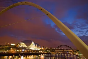 Looking Up The Tyne At Dusk Through The Winking Bridge To The Sage Centre Looking Up The Tyne At Dusk Through The Winking Bridge To The Sage Centre