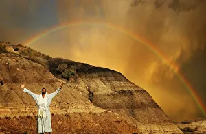 Man With Outstretched Arms, Rainbow In Background Man With Outstretched Arms, Rainbow In Background