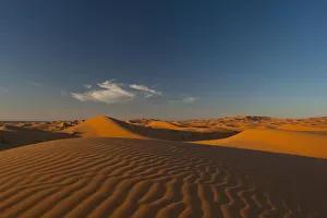 Morocco, Sand dune at dusk near Merzouga in Sahara Desert; Erg Chebbi area Morocco, Sand dune at dusk near Merzouga in Sahara Desert; Erg Chebbi area