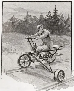 A Nineteenth Century Three Wheeled Velocipede On A Railroad Track A Nineteenth Century Three Wheeled Velocipede On A Railroad Track