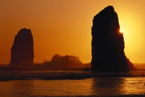 Oregon Coast, Sunset Over Sea Stacks At Cannon Beach Oregon Coast, Sunset Over Sea Stacks At Cannon Beach