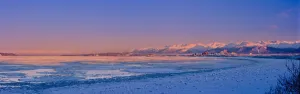 Panorama View Of The Anchorage Skyline Just Before Dawn As Seen From Earthquake Park During Winter, Southcentral Alaska Panorama View Of The Anchorage Skyline Just Before Dawn As Seen From Earthquake Park During Winter, Southcentral Alaska