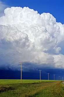 Images Dated 22nd January 2012: Power Lines With A Cumulonimbus Supercell Cloud Mass, Near Bromhead, Saskatchewan