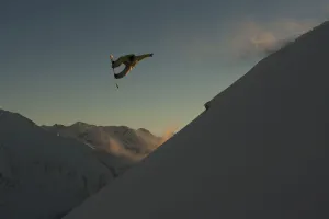Professional Snowboarder, Frederik Kalbermatten, Extreme Snowboarding At Sunset, Arlberg, Austria Professional Snowboarder, Frederik Kalbermatten, Extreme Snowboarding At Sunset, Arlberg, Austria