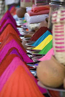 Rows Of Colorful Cone-Shaped Puga Pigment At Devaraja Market In Mysore, Karnataka, India Rows Of Colorful Cone-Shaped Puga Pigment At Devaraja Market In Mysore, Karnataka, India