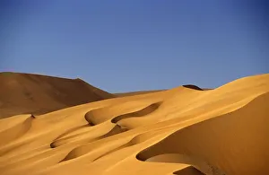 Sand Dune Against Clear Sky In Namib-Naukluft National Park Sand Dune Against Clear Sky In Namib-Naukluft National Park