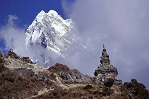 Snow Covered Peak With Cultural Monument In Forefront Snow Covered Peak With Cultural Monument In Forefront