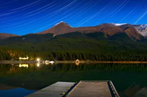 Starry Night Of Mountains And Lake, Maligne Lake, Jasper National Park, Alberta, Canada Starry Night Of Mountains And Lake, Maligne Lake, Jasper National Park, Alberta, Canada