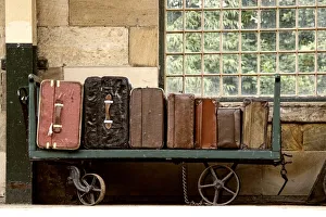 Suitcases On A Luggage Trolley In A Train Station Suitcases On A Luggage Trolley In A Train Station