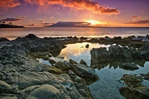 Sunset Reflected In The Tranquil Tide Pools Along The Coast; Hawaii, United States Of America Sunset Reflected In The Tranquil Tide Pools Along The Coast; Hawaii, United States Of America