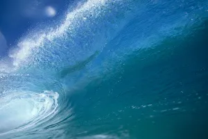 Front View Of Aqua Wave, Tube, Blue Sky, Glassy And Flat Front View Of Aqua Wave, Tube, Blue Sky, Glassy And Flat