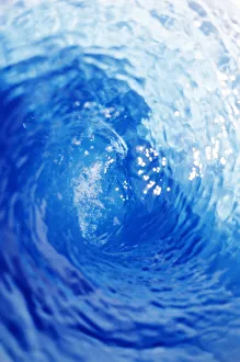 View From Inside Tube Of Wave, Circular Pattern, Sun Reflections In The Blue Water View From Inside Tube Of Wave, Circular Pattern, Sun Reflections In The Blue Water