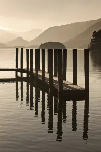 Wooden Dock In The Lake At Sunset, Cumbria, England Wooden Dock In The Lake At Sunset, Cumbria, England