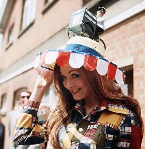 1971 Clothing Ascot Fashion Hats and Dresses Barbara Allen in a straw boater with a 1971 Clothing Ascot Fashion Hats and Dresses Barbara Allen in a straw boater with a