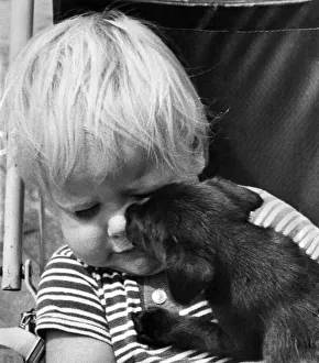 2 year old Jason Swain, of Erith, Kent , was given his first puppy 2 year old Jason Swain, of Erith, Kent , was given his first puppy
