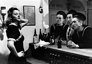 ABWW2 34 Sailors at the bar of a pub looking at barmaid ABWW2 34 Sailors at the bar of a pub looking at barmaid