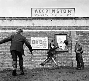 Accrington Collection: Accrington Stanley. No more football inside the ground so three youngsters play outside