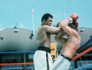 Action during the heavyweight world title fight between American Muhammad Ali Action during the heavyweight world title fight between American Muhammad Ali