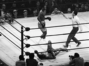 Action during the heavyweight World title fight between champion Joe Frazier Action during the heavyweight World title fight between champion Joe Frazier