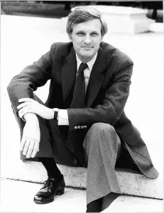 Actor Alan Alda sitting on a kerb - September 1981 Actor Alan Alda sitting on a kerb - September 1981