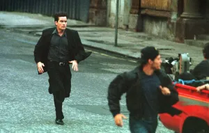 ACTOR CHARLIE SHEEN FILMING IN GLASGOW JULY 1997 IS SEEN RUNNING BEHIND A MOVING ACTOR CHARLIE SHEEN FILMING IN GLASGOW JULY 1997 IS SEEN RUNNING BEHIND A MOVING