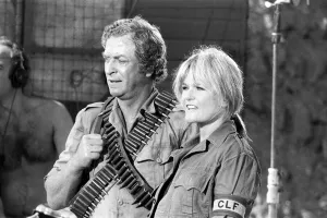 Actor Michael Caine with Valerie Perrine during filming of their latest movie " Actor Michael Caine with Valerie Perrine during filming of their latest movie "